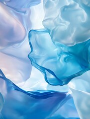 Poster - Colorful Translucent Fabrics Create a Dreamy Atmosphere, Intertwining Shades of Blue and Soft Pastels in a Delicate Dance Beneath Bright Light