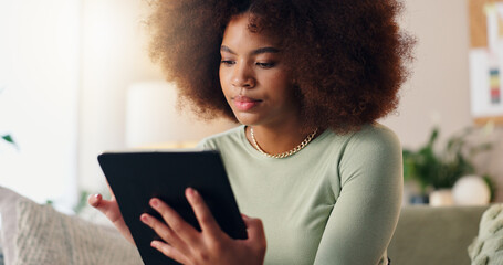 Poster - Tablet, home and African woman with social media, scroll and student reading online article for college. Digital, internet and internet search with blog app, technology and living room with email