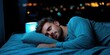 © AnuStudio - Sleep Hygiene concept, A man peacefully sleeps on a bed with soft lighting, creating a serene nighttime atmosphere filled with gentle bokeh effects.