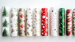 © Rabia's Creative - rolls of Christmas wrapping isolated on white