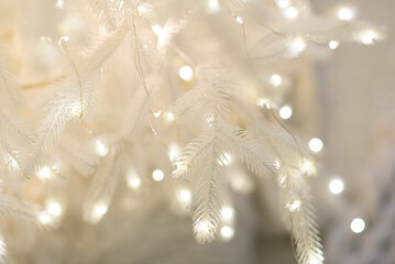 Wall Mural - merry christmas and new year holidays background. blurred bokeh background with light bulbs and chri