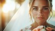 © familymedia - A beautiful bride with an expression of pure happiness, gently holding a bouquet of roses. The soft backlighting highlights her serene and joyful demeanor perfectly.