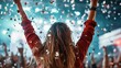 © familymedia - A DJ, with arms raised, stands amidst falling confetti, captivating a lively audience with electrifying energy and dynamic stage lighting backdrop.