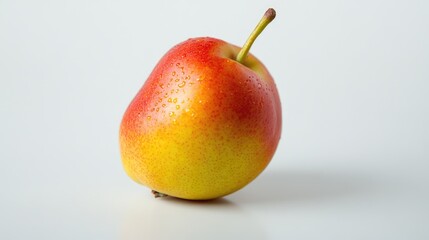Leinwandbilder - Red and yellow pear fruit with water droplets isolated on a white background showcasing freshness and vibrant colors of healthy produce