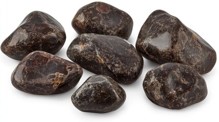 Fototapete - Smooth beach stones arranged on a clean white background showcasing natural textures and colors ideal for decorative or nature themes
