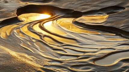 Poster - Golden hour reflection on water surface creating abstract patterns in a natural landscape during sunset with selective focus on waves