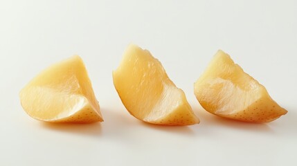 Poster - Slices of fresh apple arranged on a clean white background ideal for graphic design and culinary presentations