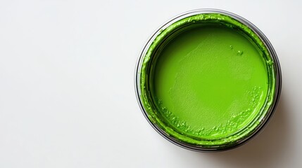 Poster - Bright green paint in an open can on a clean white background showcasing vibrant color and texture for design and renovation concepts