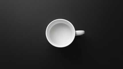 Poster - Empty white cup on a sleek black surface seen from above creating a minimalist and modern aesthetic for beverage or kitchen-themed concepts