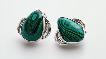 Poster - Malachite and silver earring design showcasing intricate patterns on a clean white background