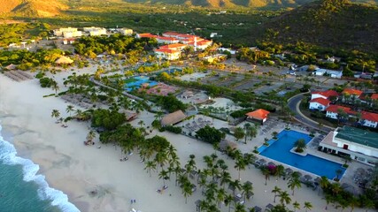 Wall Mural -  beach with a resort in the background