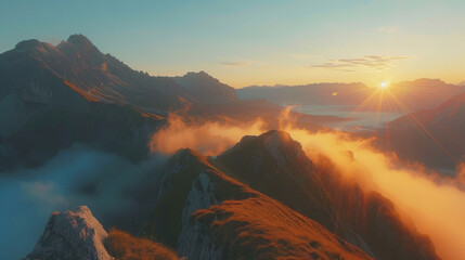 Wall Mural - The sun is setting over a mountain range, casting a warm glow over the landscape