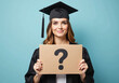 © Galeno - recent graduate holds cardboard sign question mark representing uncertainty graduation uncertain future