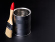 © Piotr - Empty metal can and paint brush on a dark background.