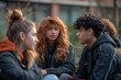 © Vera - Multiracial Millennials Gathered in Circle for Group Discussion