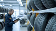 © NN AI - Auto mechanic checking tire inventory, horizontal, perfect for car service promotions, seasonal tire change campaigns, auto parts stores, and vehicle maintenance services