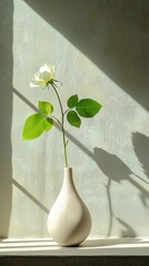 Poster - A minimalist vase holding a single rose in a calm and bright space Stock Photo with side copy space