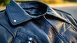 © DSN_1 - Close-up of a Black Leather Jacket's Collar and Texture