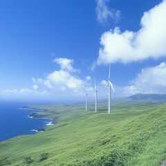 Poster - Coastal wind turbines on a green hill, blue ocean and sky.