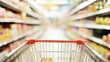 © Gophotograph - A defocused supermarket interior emphasizes the absence of products in the cart.