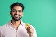 © Shivani - young man showing bitcoin
