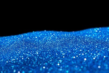 Poster - Mesmerizing Close-Up of Blue Glitter with Sparkling Particles Against a Black Background, Perfect for Creative Projects and Decorative Uses
