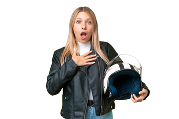 Poster - Young pretty blonde woman with a motorcycle helmet over isolated chroma key background surprised and shocked while looking right