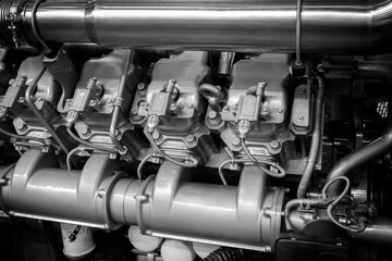 Aufkleber - Big gas engine diesel generator electric power with many wires pipes industrial machine concept background