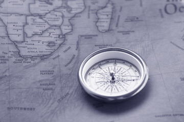 Wall Mural - classic round compass on background of old vintage map