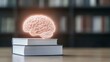 © A4719 - Glowing Brain Icon Above Books Knowledge Wisdom Learning Education Concept