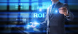 © WrightStudio - ROI Return on investment reading revenue business concept on virtual screen.