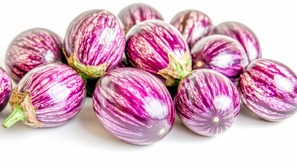 Wall Mural - Shiny, deep purple eggplant isolated against a white background, fresh and vibrant