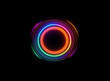 © joeycheung - Vibrant, concentric neon rings glow in the dark, creating a mesmerizing circular light display.  The multicolored circles radiate energy and form a hypnotic pattern.