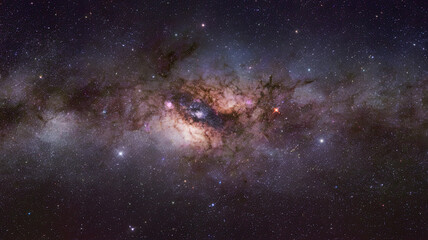 Wall Mural - breathtaking view of night sky dominated by dense star cluster, luminous band stretched across, coun