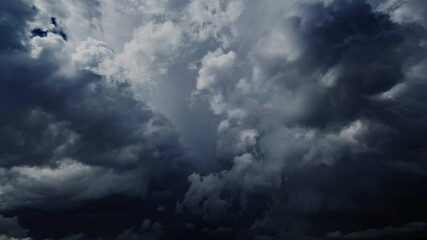 Wall Mural - Lot of lightning during a thunderstorm. Storm clouds are moving fast on the viewer, timelapse 4k