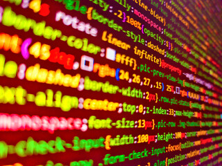 programming software code on computer screen which develop by the programmer to solve the business r