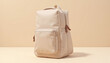 © Olesia - Stylish beige diaper bag mockup with a front pocket and zipper on a soft beige background, ideal for product display