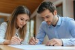 © Oleksandr - Young couple reviews and signs contract for real estate purchase at a bright indoor space