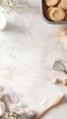 © hamzahalderad - White marble background with baking ingredients and freshly baked cookies, ready for a delicious treat.