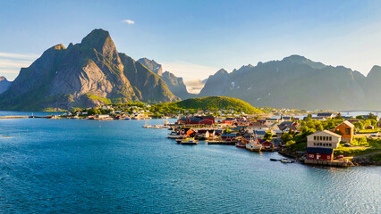 Wall Mural - explore the picturesque village of reine in norways lofoten islands, where majestic mountains and tr