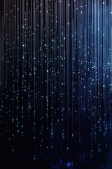 Poster - Hanging blue lights create a mesmerizing atmosphere in a dark space