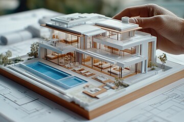 Aufkleber - A detailed architectural model of a modern house with a pool, showcasing design elements.