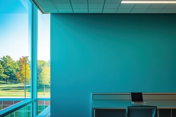 Poster - A serene office space featuring a desk, laptop, and large window with a view of greenery.