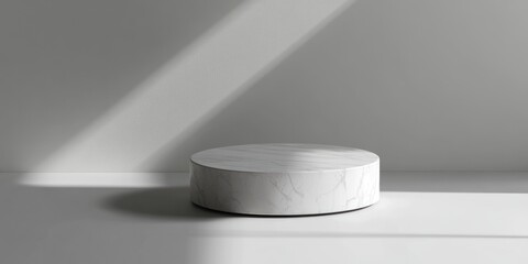 Aufkleber - A minimalist round marble pedestal casting shadows in a bright, empty space.