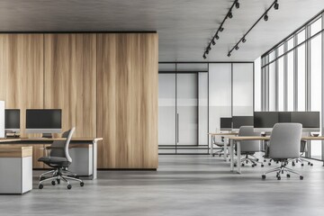 Aufkleber - Modern office interior featuring desks, computers, and large windows for natural light.