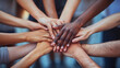 © Yoonnam - Multiple hands from diverse individuals coming together in unity, symbolizing teamwork, collaboration, inclusivity, and collective effort. A vibrant representation of diversity and shared goals