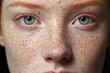 © larisikstefania - close up face green eyed red haired young woman with freckles on face