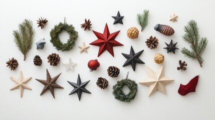 Fototapete - Holiday decorations, including Christmas stars and mini wreaths, creatively arranged on a pristine white surface