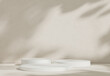© CreatifyStudio - Abstract studio room with realistic white cylinder pedestal podium set and leaf shadow overlay. Minimal scene for product display presentation. geometric platform stage for showcase