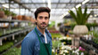 ©  Mohammad Xte - Portrait of a Plant Shop Owner Standing Amidst Lush Greenery with a Warm Smile